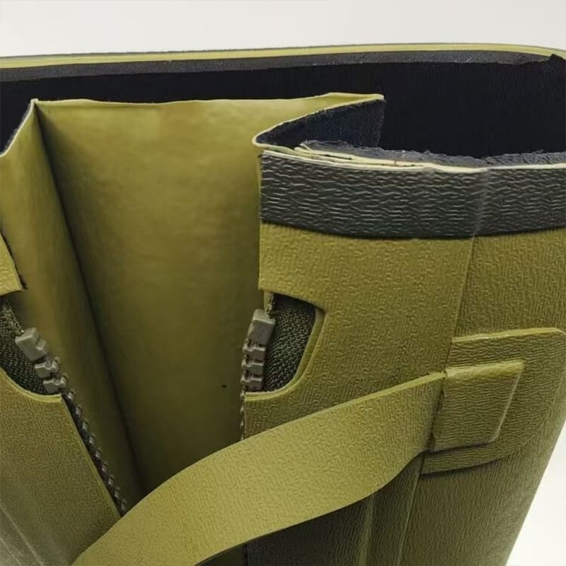 A rubber gusset is located under the zipper on the side of the boot